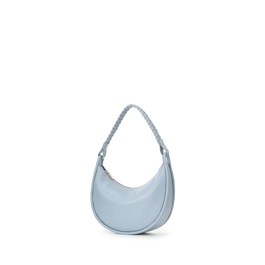 Eriko Yamaguchi Round Moon 2-Way leather handbag in Light Blue angled view
